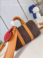 Louis Vuitton Keepall Bandoulière 25 Bag Gold – LW130