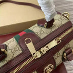 Gucci Savoy medium duffle bag in Beige GG Canva – BG085