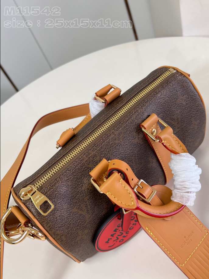 Louis Vuitton Keepall Bandoulière 25 Bag Gold – LW130