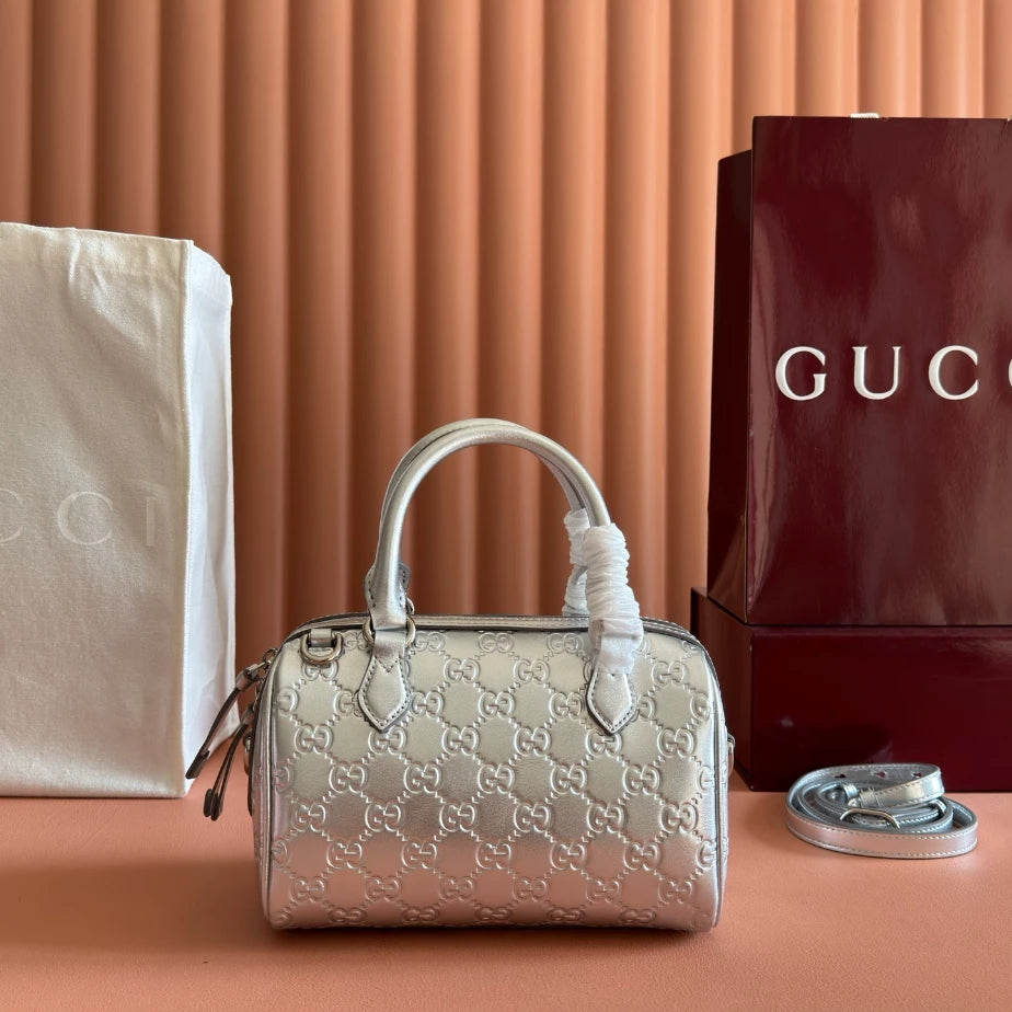 GUCCI GG EMBLEM SMALL HANDLE BAG – BG214