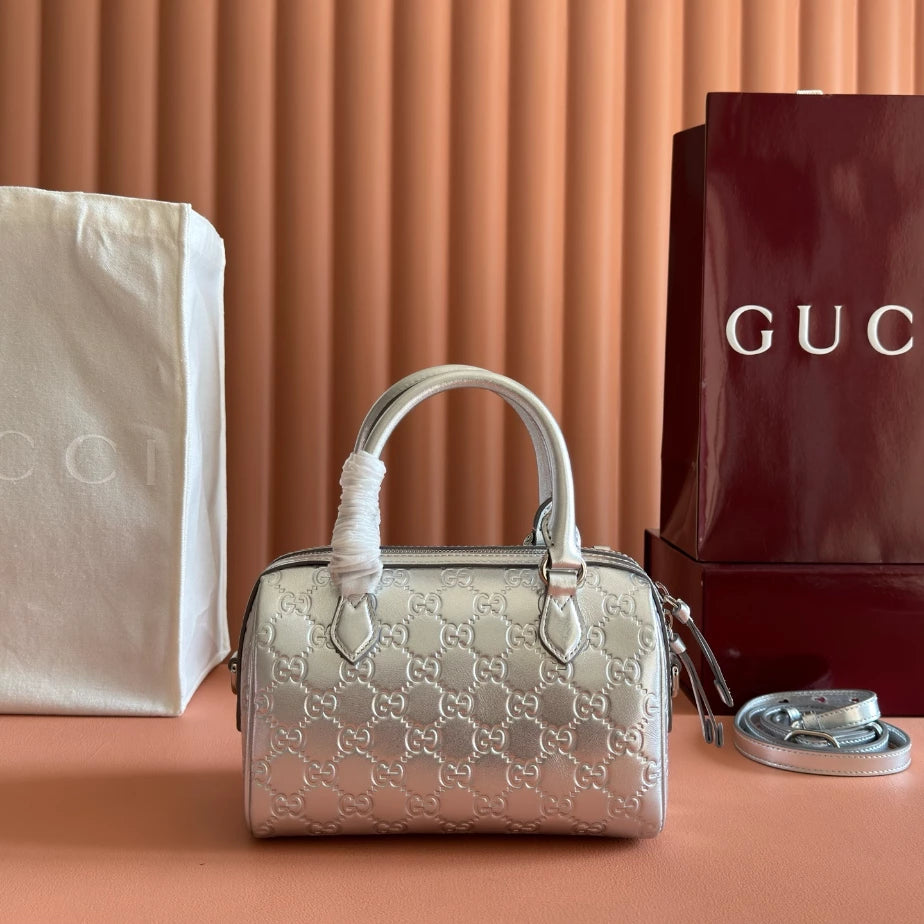 GUCCI GG EMBLEM SMALL HANDLE BAG – BG214