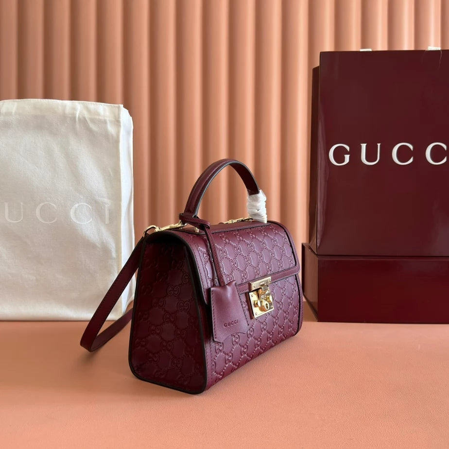 GUCCI PADLOCK MEDIUM TOP HANDLE BAG – BG219