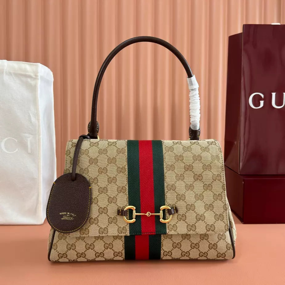 GUCCI PAPARAZZO MEDIUM TOP HANDLE BAG – BG174