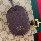 GUCCI PAPARAZZO MEDIUM TOP HANDLE BAG – BG174
