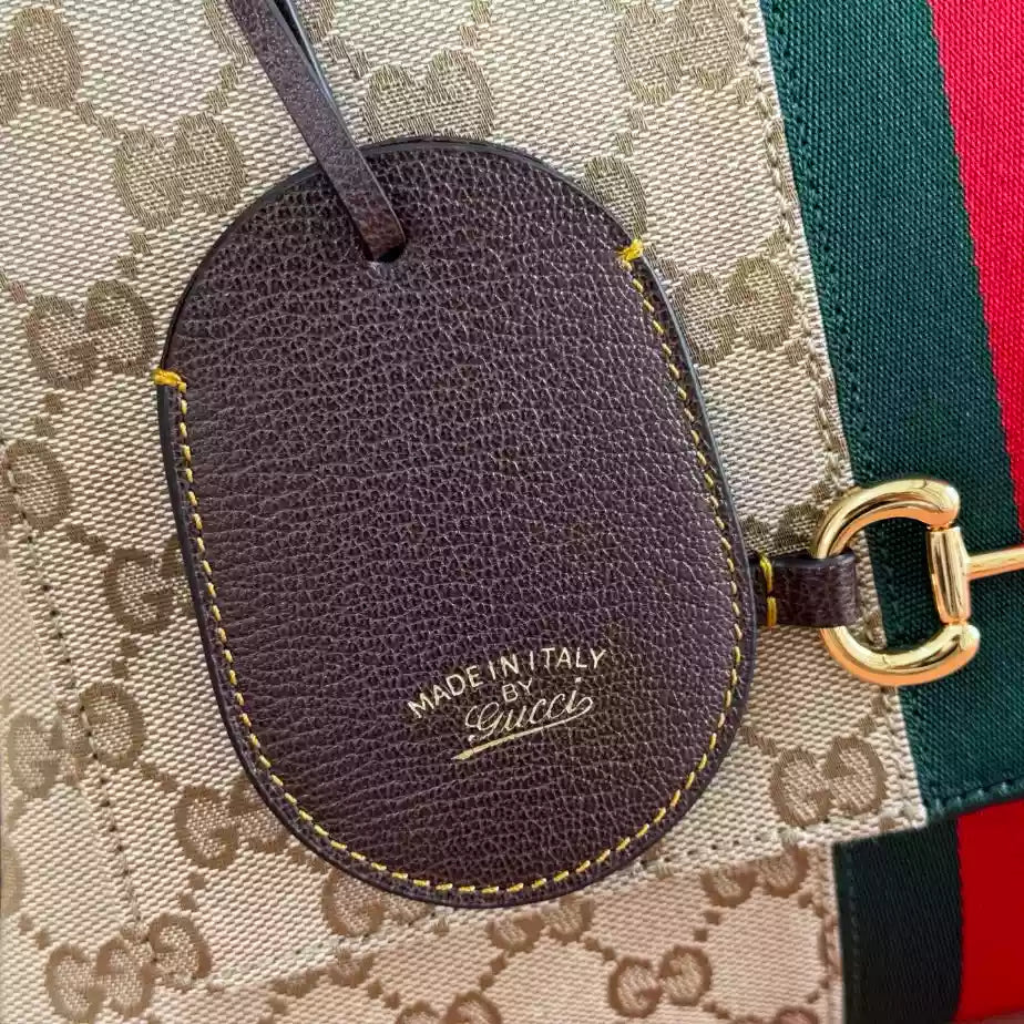 GUCCI PAPARAZZO MEDIUM TOP HANDLE BAG – BG174