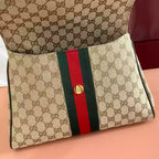 GUCCI PAPARAZZO MEDIUM TOP HANDLE BAG – BG174