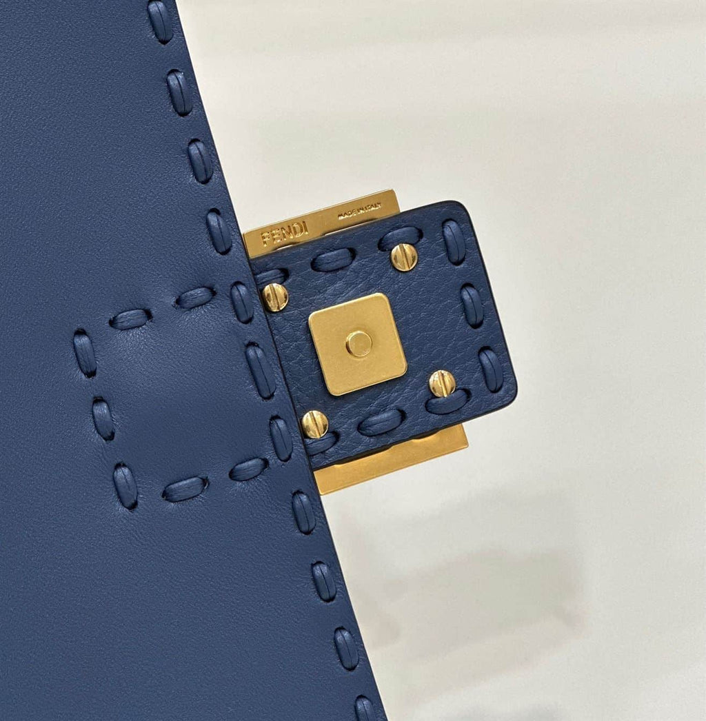 FENDI BAGUETTE BLUE SELLERIA BAG WITH OVERSIZE TOPSTITCHING – F029