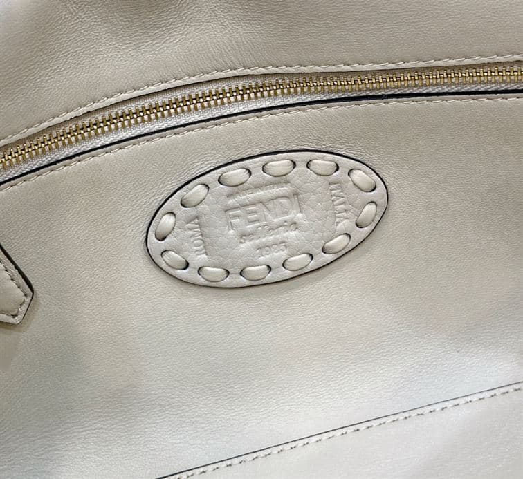 FENDI BAGUETTE CAMELLIA SELLERIA BAG WITH OVERSIZE TOPSTITCHING – F027