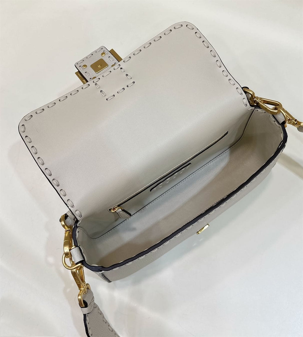 FENDI BAGUETTE CAMELLIA SELLERIA BAG WITH OVERSIZE TOPSTITCHING – F027
