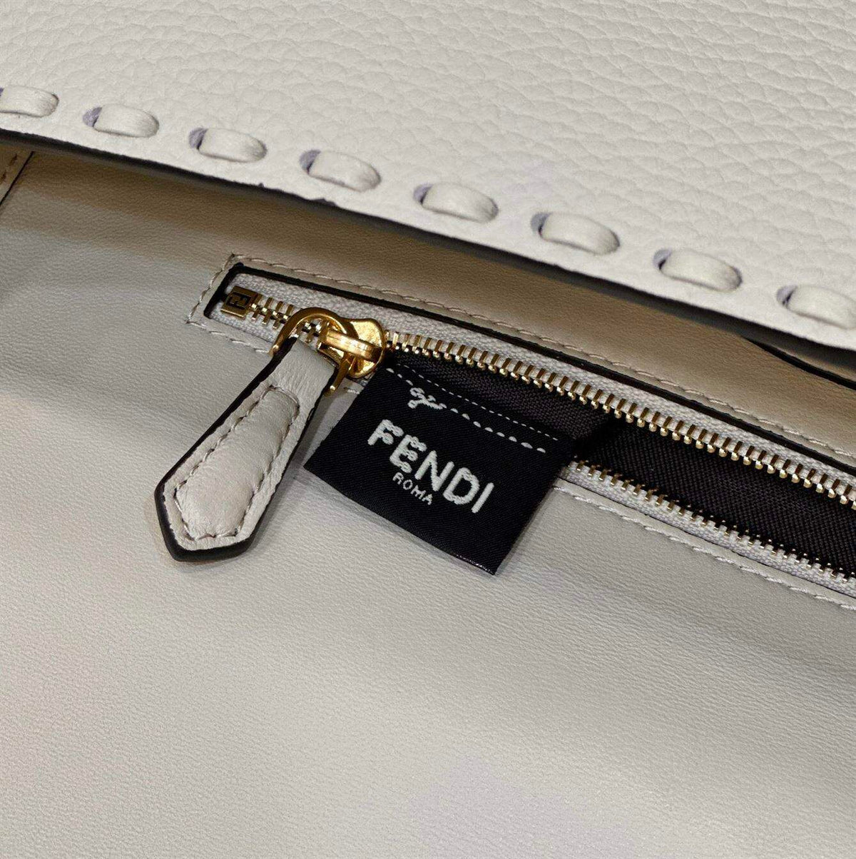 FENDI BAGUETTE CAMELLIA SELLERIA BAG WITH OVERSIZE TOPSTITCHING – F027