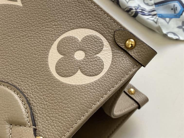 LOUIS VUITTON ONTHEGO MM BICOLOR MONOGRAM EMPREINTE – LW040