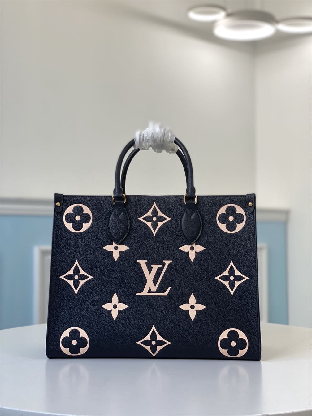 LOUIS VUITTON ONTHEGO MM BICOLOR MONOGRAM EMPREINTE – LW041