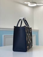 LOUIS VUITTON ONTHEGO MM BICOLOR MONOGRAM EMPREINTE – LW041