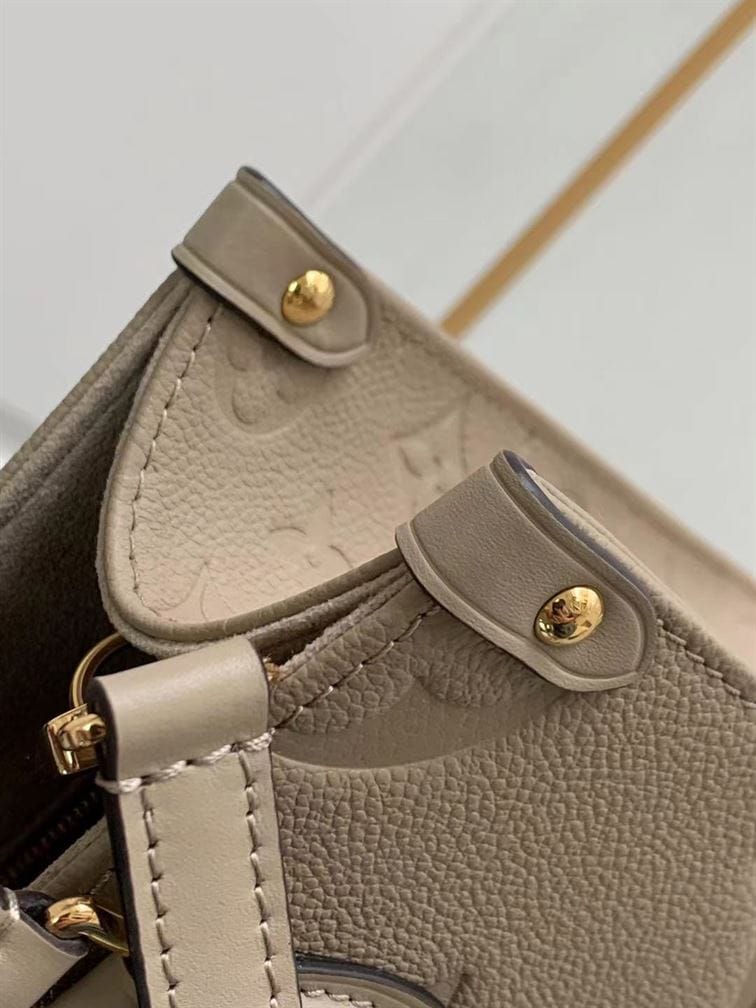 LOUIS VUITTON ONTHEGO PM MONOGRAM EMPREINTE – LW034