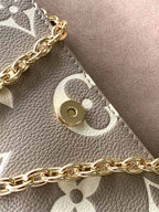 LOUIS VUITTON WALLET ON CHAIN IVY BICOLOR MONOGRAM EMPREINTE LEATHER – LW038
