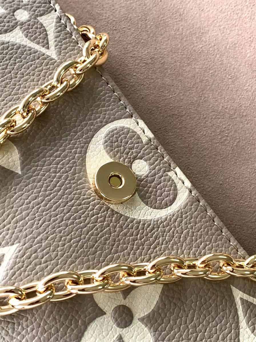 LOUIS VUITTON WALLET ON CHAIN IVY BICOLOR MONOGRAM EMPREINTE LEATHER – LW038