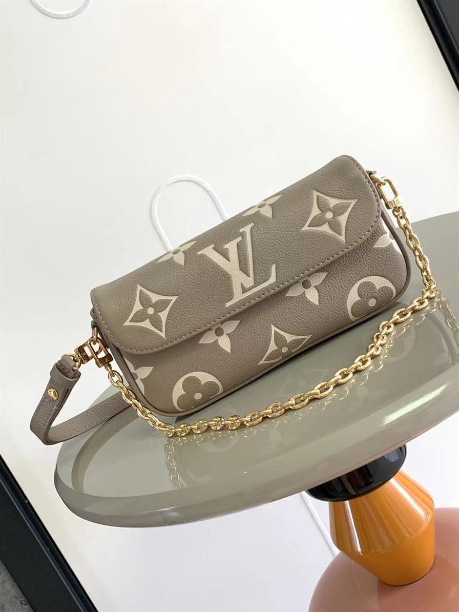 LOUIS VUITTON WALLET ON CHAIN IVY BICOLOR MONOGRAM EMPREINTE LEATHER – LW038