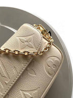 LOUIS VUITTON WALLET ON CHAIN IVY MONOGRAM EMPREINTE LEATHER – LW037
