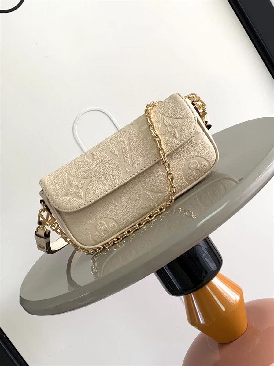 LOUIS VUITTON WALLET ON CHAIN IVY MONOGRAM EMPREINTE LEATHER – LW037