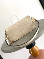 LOUIS VUITTON WALLET ON CHAIN IVY MONOGRAM EMPREINTE LEATHER – LW037
